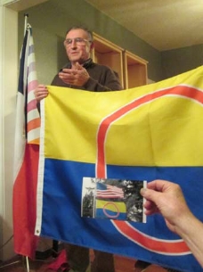 Fred Barrett describes his proposed flag for Oregon, as an image of it flying is viewed.