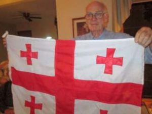 "Georgia on My Mind" -- Sam Oakland and one of his many cross-themed flags