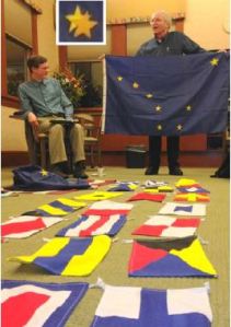 Michael Orelove displays his own astronomically-correct flag of Alaska