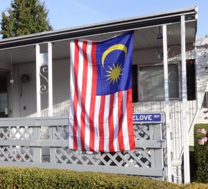Michael Orelove is commemorating the MH370 disaster by flying the Malaysian flag.