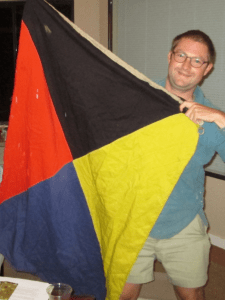 “Zulu” says Carl Larson, showing one of many maritime flags he’s acquired.