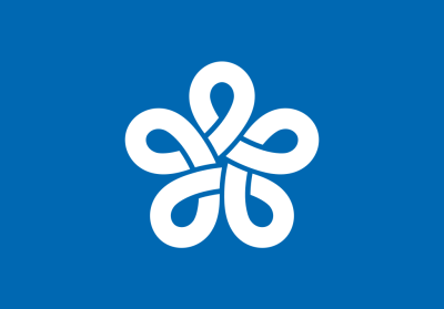 All of Japan's prefectures use what are essentially logos for their flags (and as a result can be mistaken for corporate flags).  This is Fukuoka's, a stylized  ふく (fuku) that also symbolizes a plum flower.  